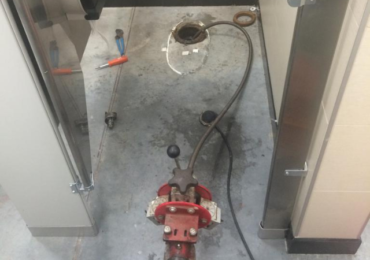 Power Rodding Toilet Drain